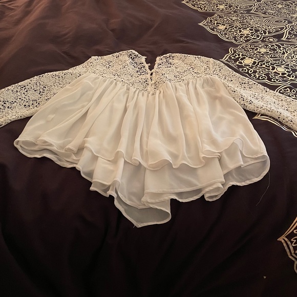 A lacy long sleeved blouse in off white - Picture 2 of 5